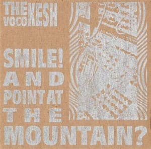 Smile! And Point At The Mountain?